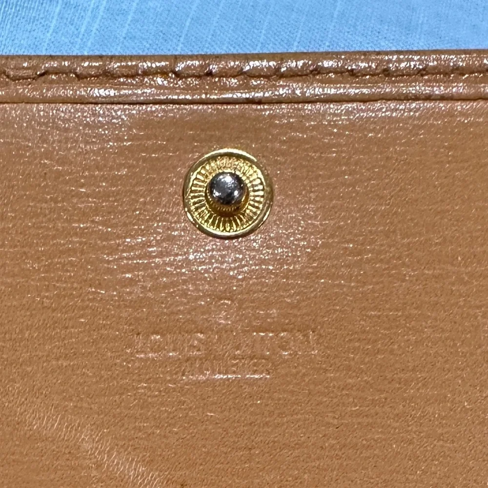 AUTHENTIC Louis Vuitton wallet. Tassel yellow.